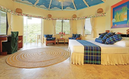 Anse Chastanet St Lucia superior bedroom king size bed  octagonal room balcony