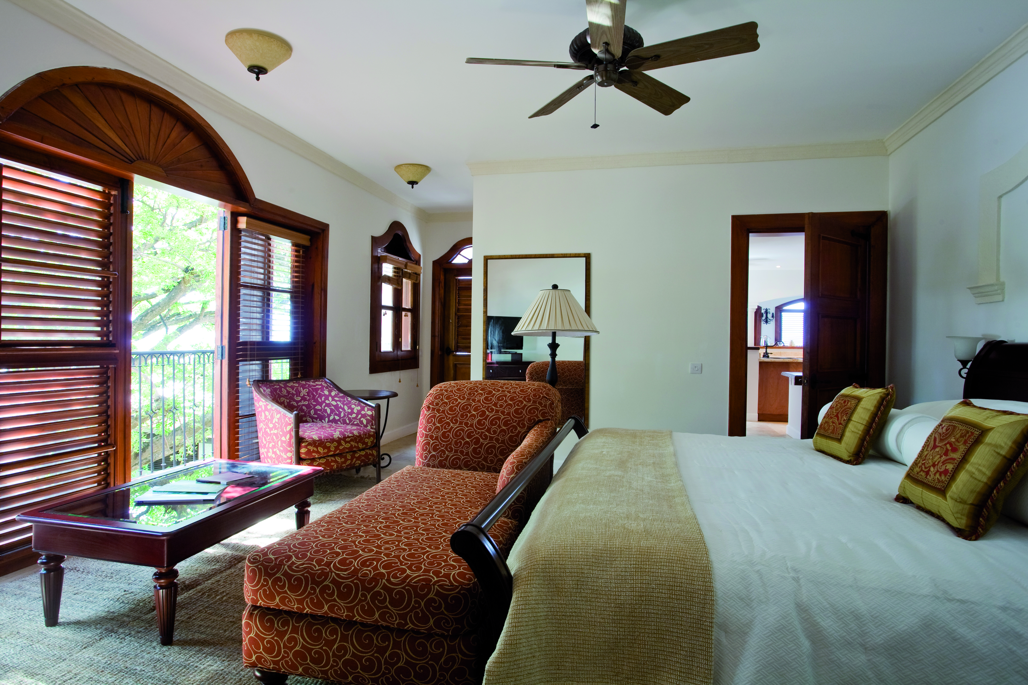 Cap Maison St Lucia villa suite bedroom armchair chaise longue en suite bathroom