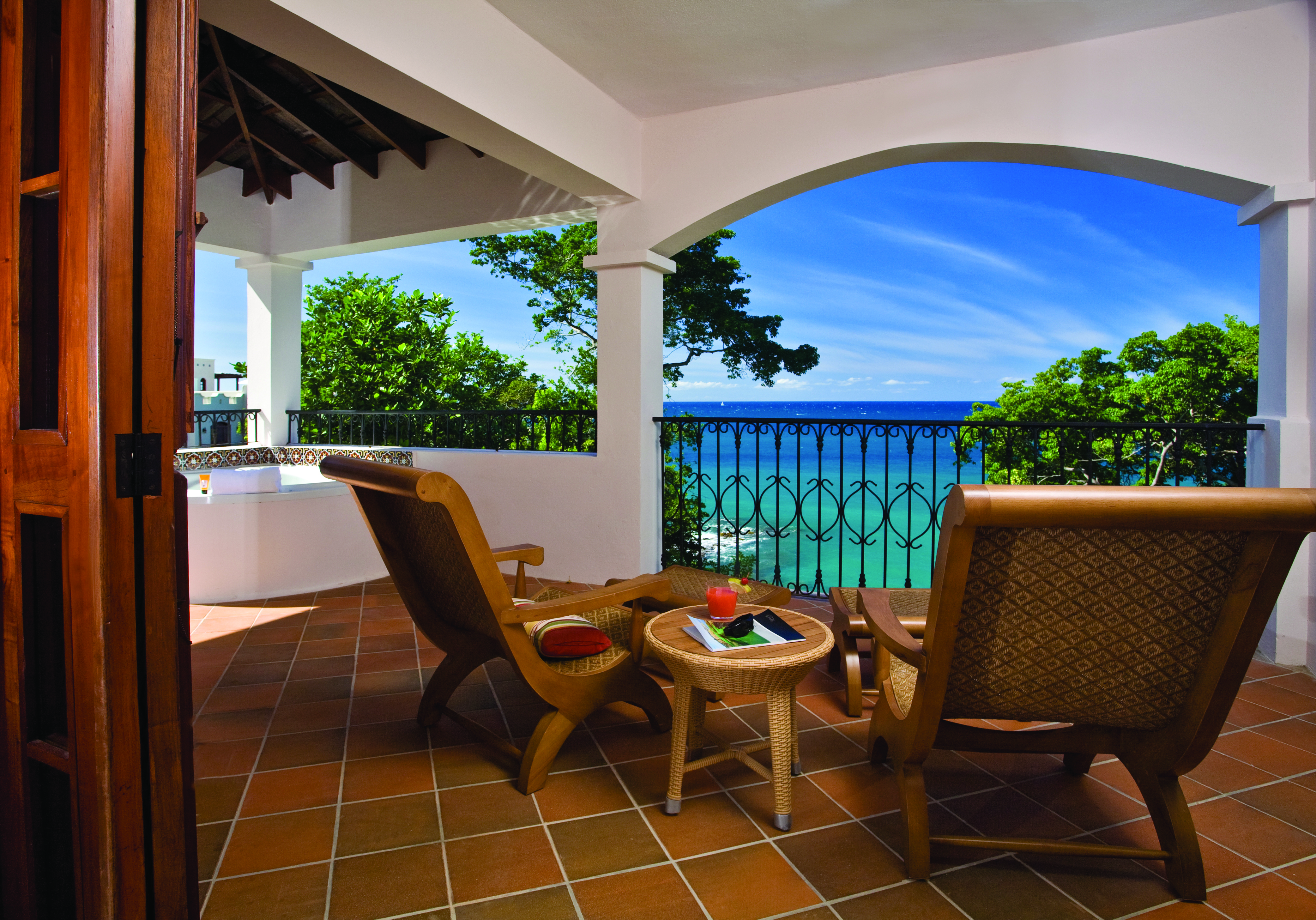Cap Maison St Lucia villa suite terrace sun loungers overlooking the ocean hot tub