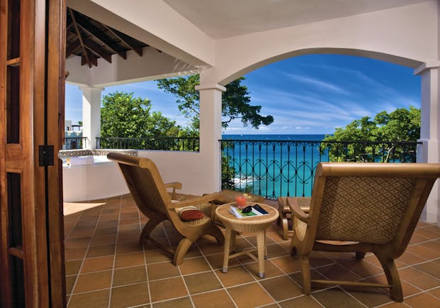 Cap Maison St Lucia villa suite terrace sun loungers overlooking the ocean hot tub