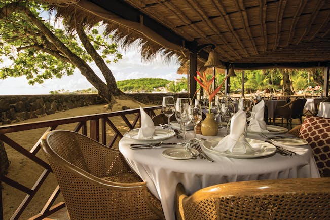 East Winds Inn St Lucia dining covered dining area adjacent to the beach