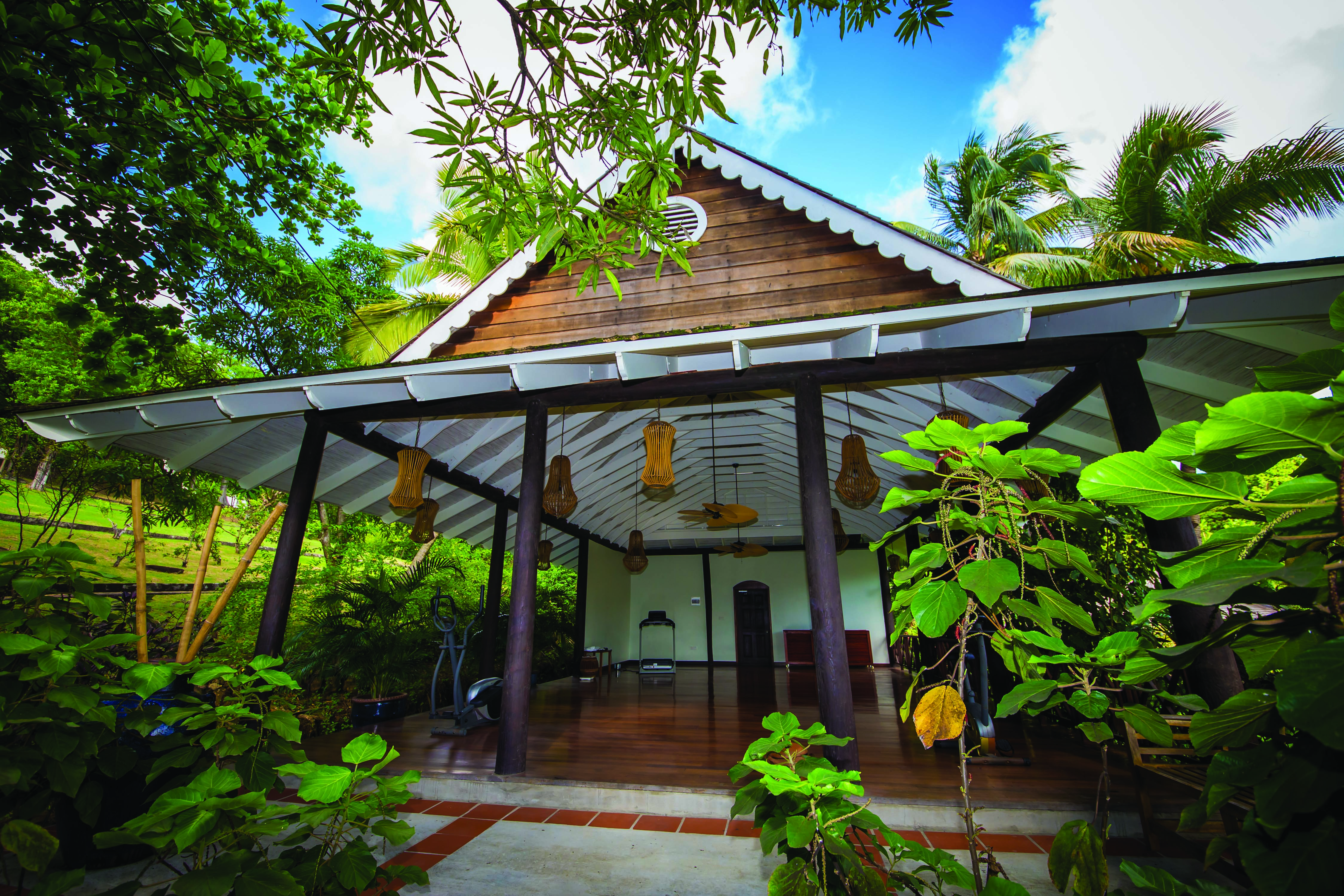 East Winds Inn St Lucia exterior building surrounded by greenery