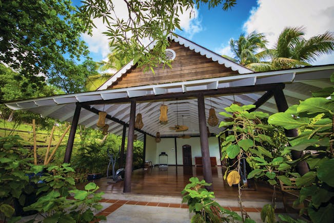 East Winds Inn St Lucia exterior building surrounded by greenery