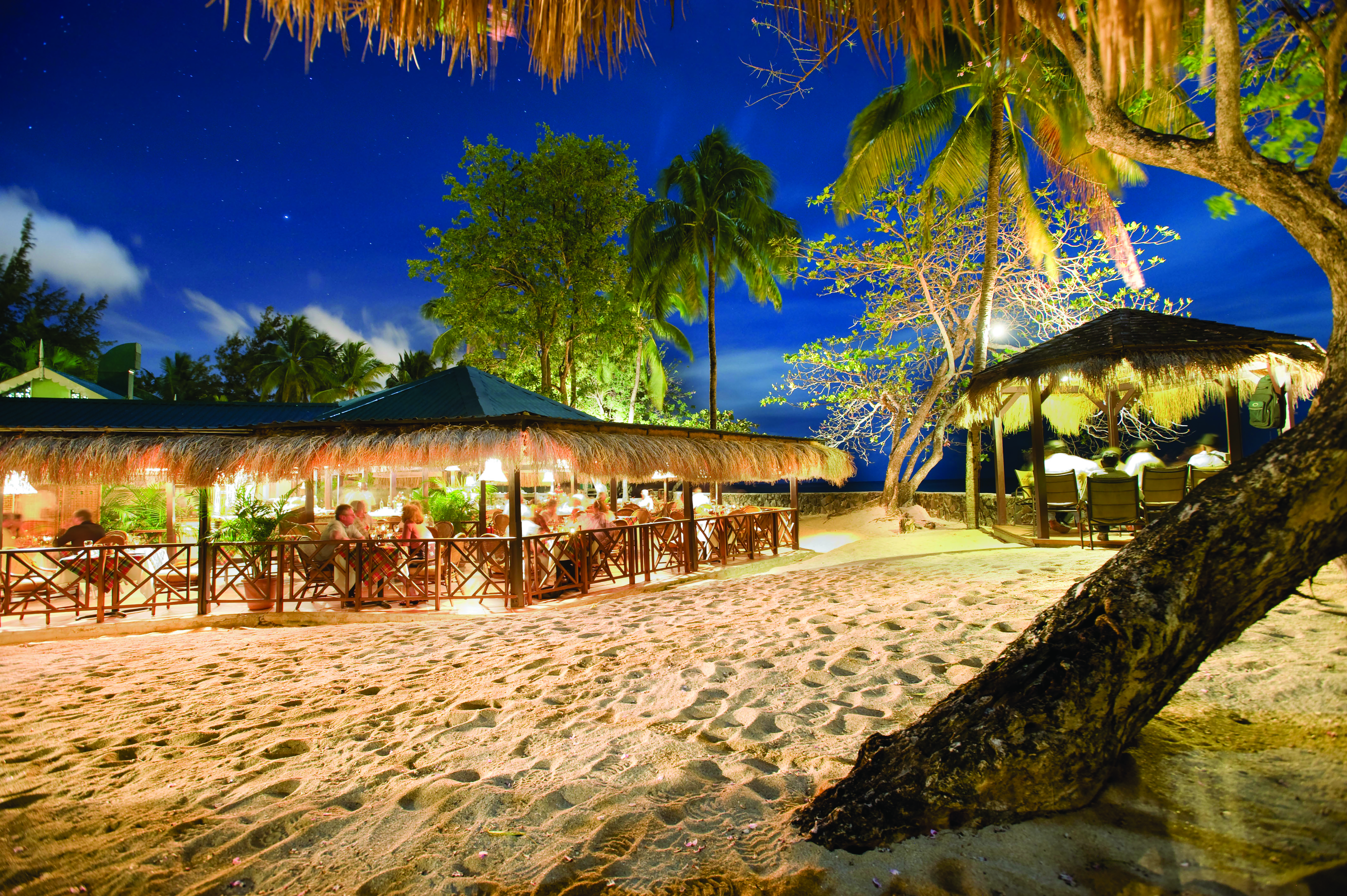 East Winds Inn St Lucia restaurant dining on the beach by night