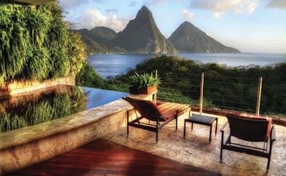 Jade Mountain St Lucia outdoor seating area and infinity pool overlooking the Caribbean sea and Pitons