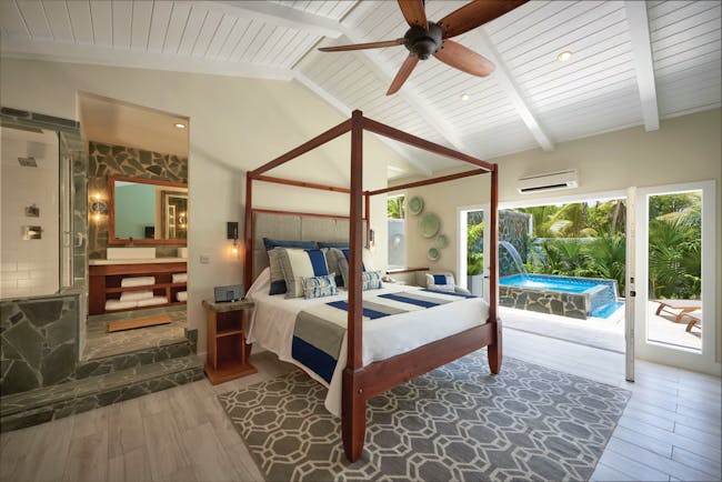 Serenity Coconut Bay St Lucia butler suite four poster bed en suite bathroom private plunge pool