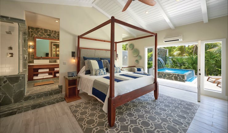 Serenity Coconut Bay St Lucia butler suite four poster bed en suite bathroom private plunge pool