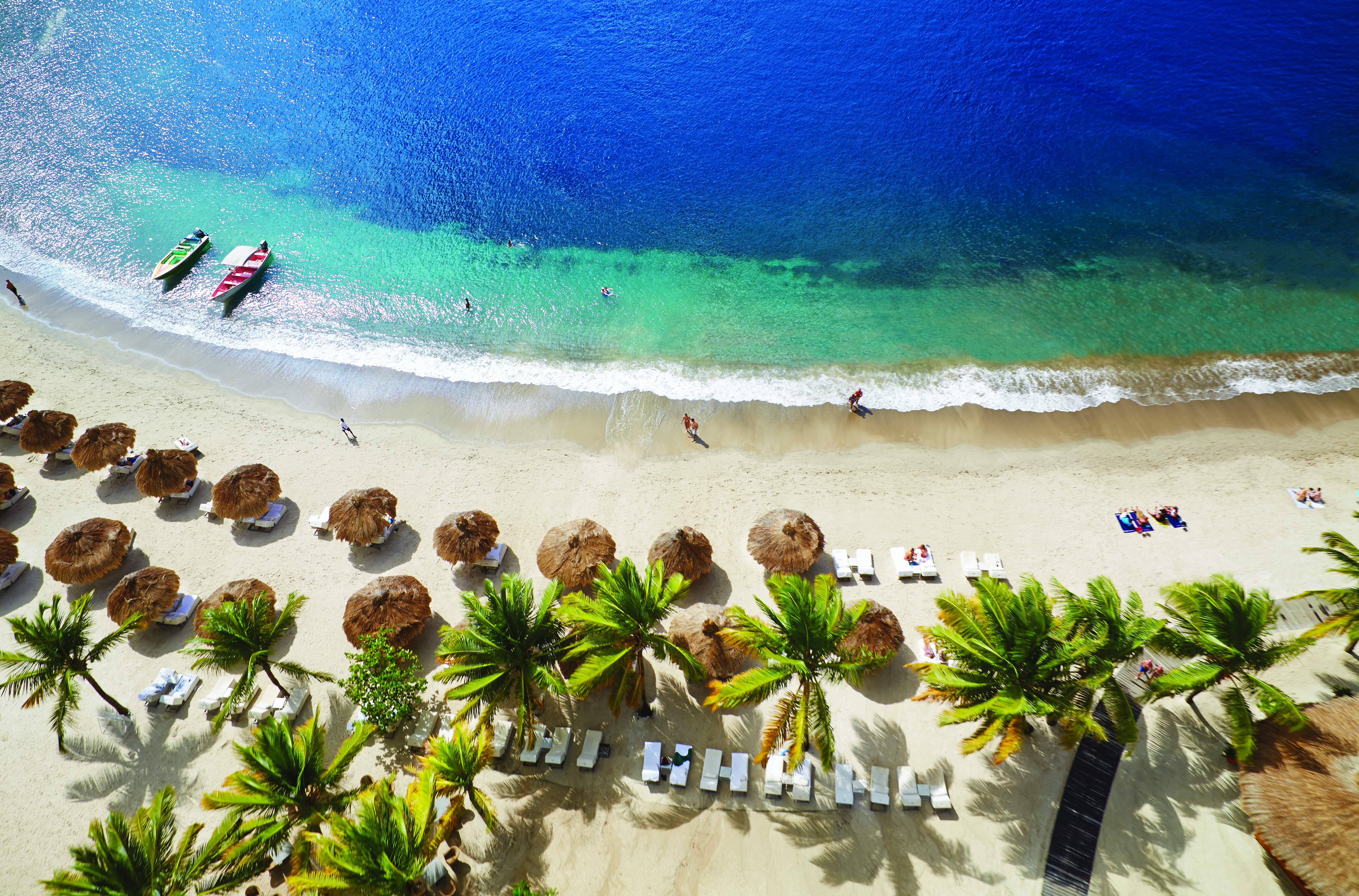 Sugarbeach St Lucia aerial shot of beach sun loungers and umbrellas