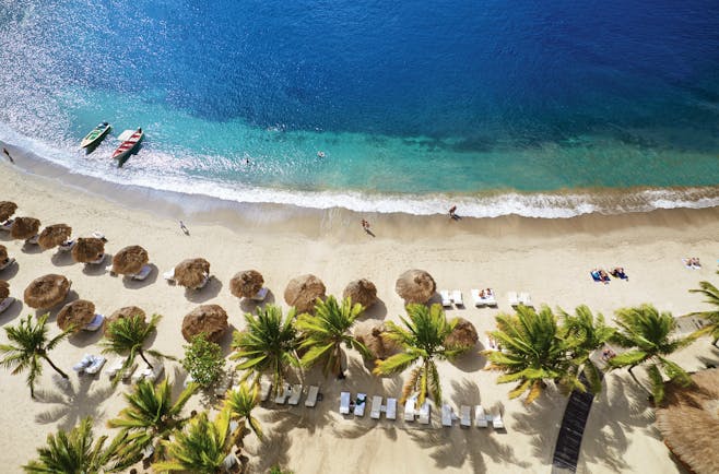 Sugarbeach St Lucia aerial shot of beach sun loungers and umbrellas