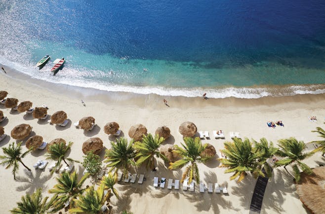 Sugarbeach St Lucia aerial shot of beach sun loungers and umbrellas
