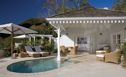 Sugarbeach St Lucia luxury villa exterior sun loungers private terrace and plunge pool 