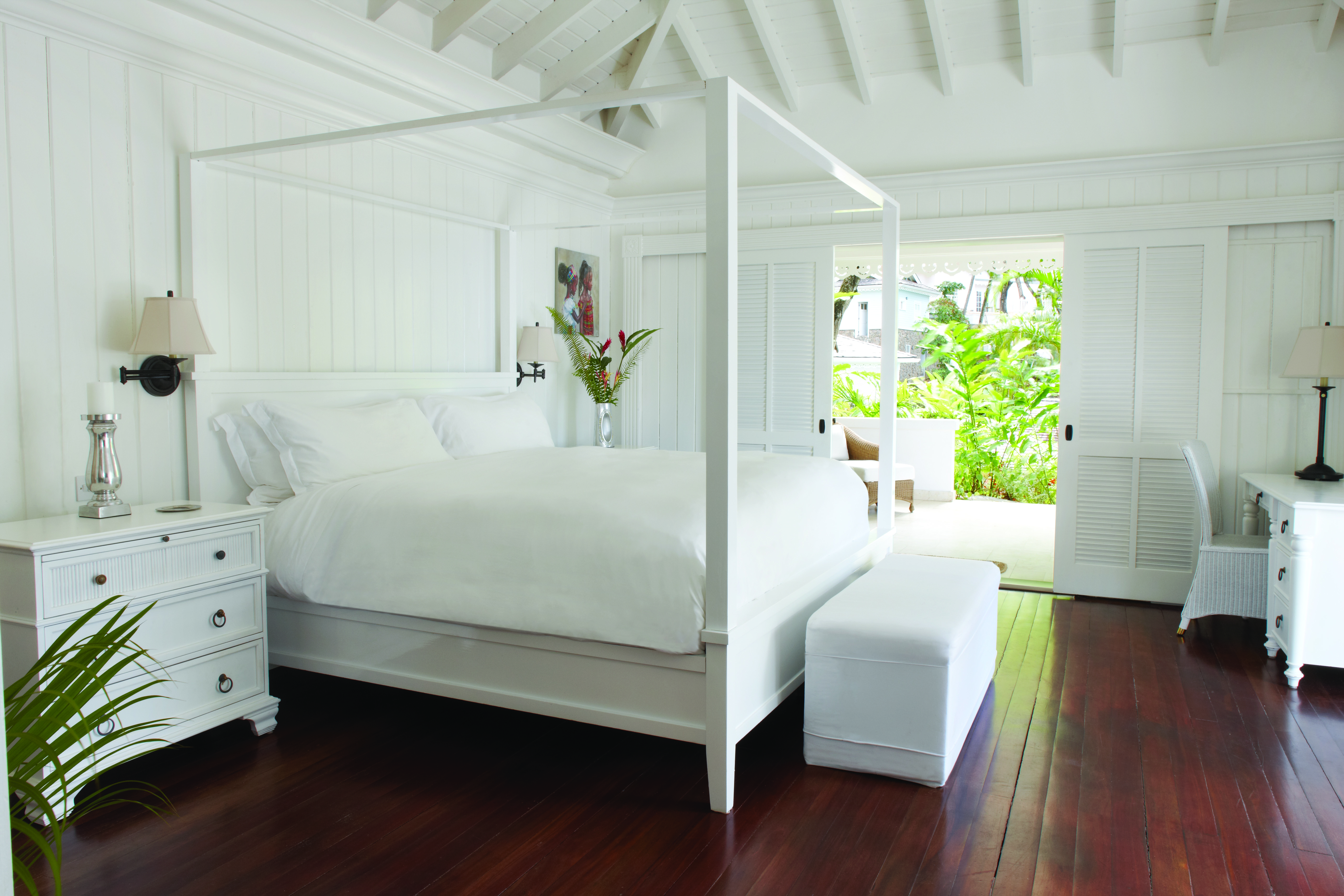 Sugarbeach St Lucia villa bedroom four poster bed doors opening to terrace