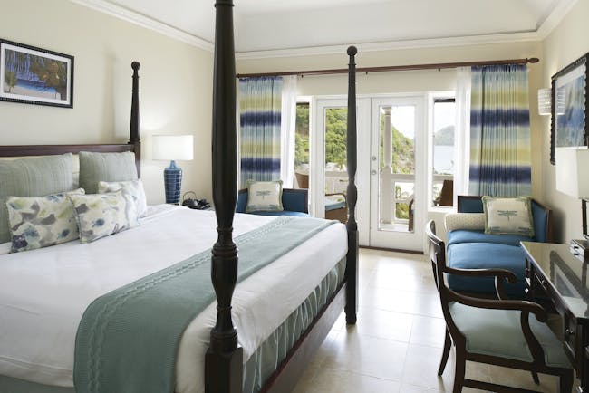 The Body Holiday St Lucia luxury ocean view room opening to balcony overlooking the sea