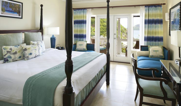 The Body Holiday St Lucia luxury ocean view room opening to balcony overlooking the sea