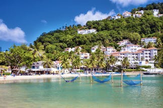 Windjammer Landing St Lucia view of resort from the sea hotel complex beach and hillside
