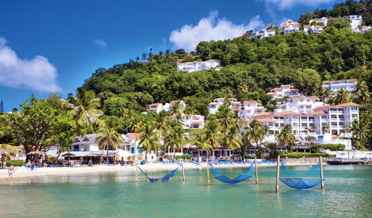 Windjammer Landing St Lucia view of resort from the sea hotel complex beach and hillside