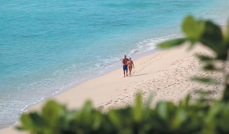 La Samanna St Martin beach couple white sand ocean