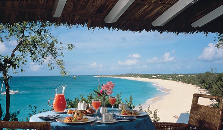 La Samanna St Martin outdoor dining covered terrace breakfast ocean view