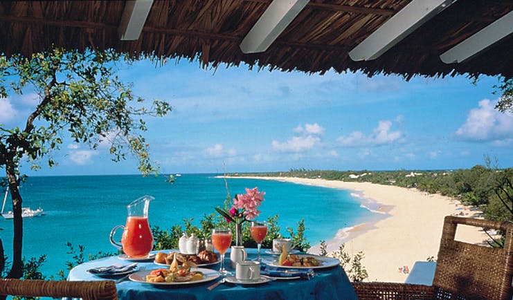 La Samanna St Martin outdoor dining covered terrace breakfast ocean view