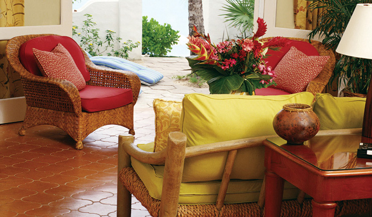 La Samanna St Martin terrace wicker armchairs floral arrangements