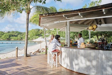 Cotton House St Vincent and the Grenadines beach bar at side of the beach