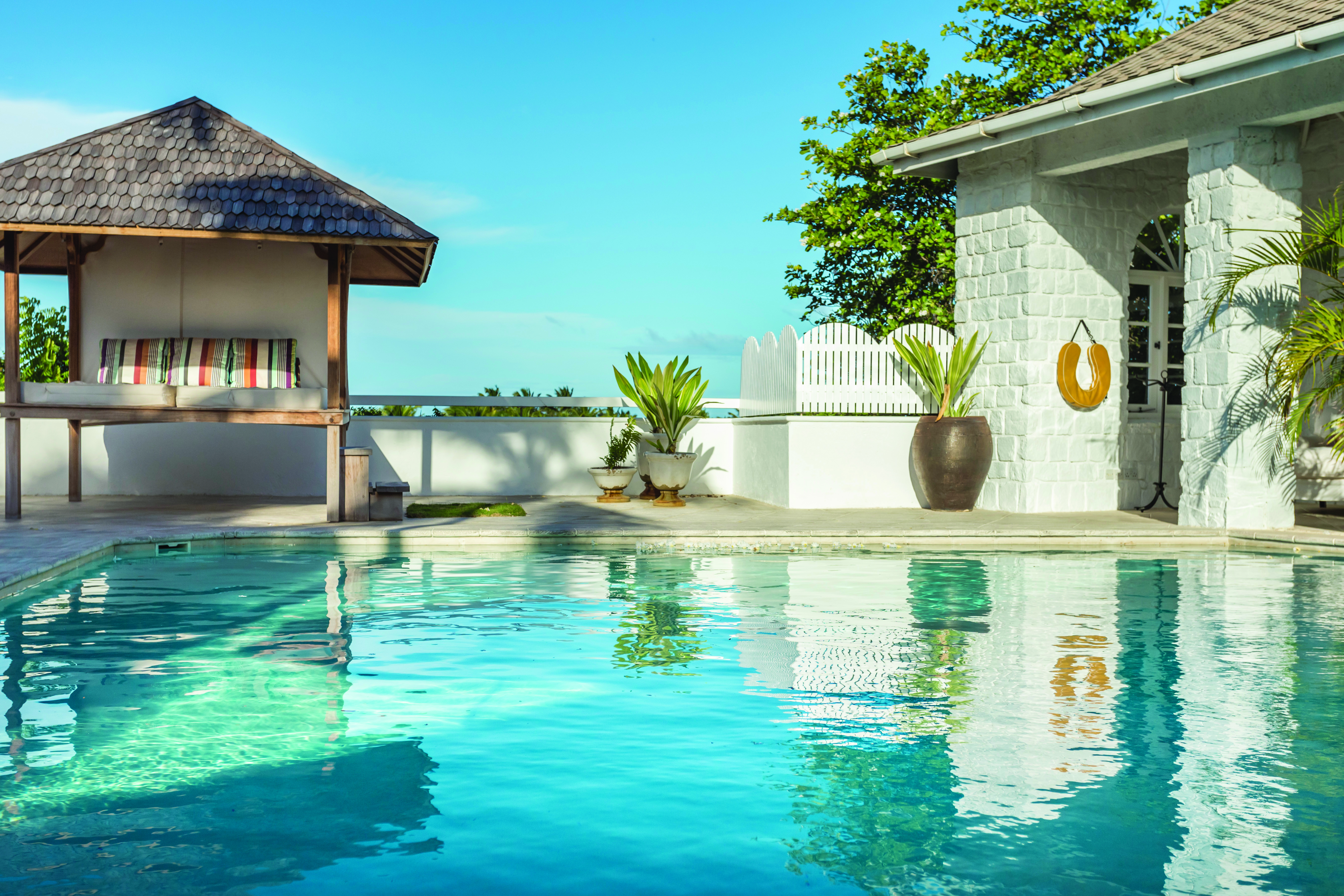 Cotton House St Vincent and the Grenadines pool with bench