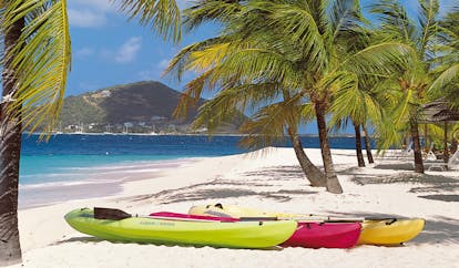 Palm Island St Vincent and the Grenadines kayaks on the beach ocean palm trees