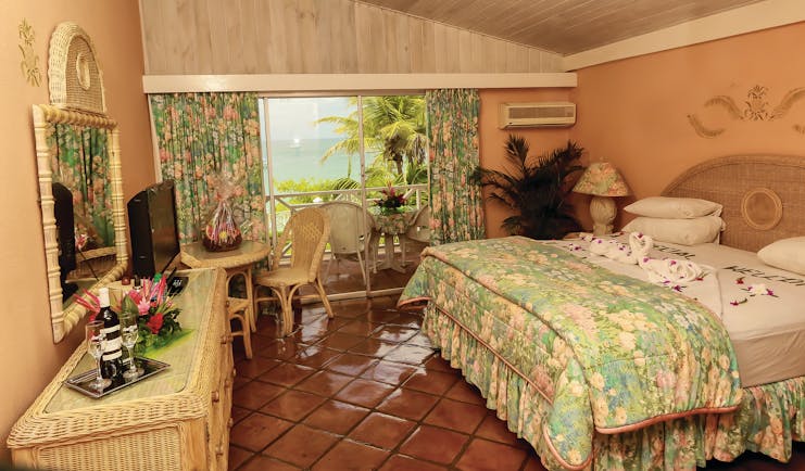 Coco Reef Tobago bedroom rattan bedroom furniture doors leading to balcony