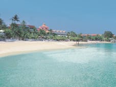 Coco Reef Tobago resort exterior beach resort in background