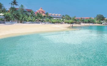 Coco Reef Tobago resort exterior beach resort in background