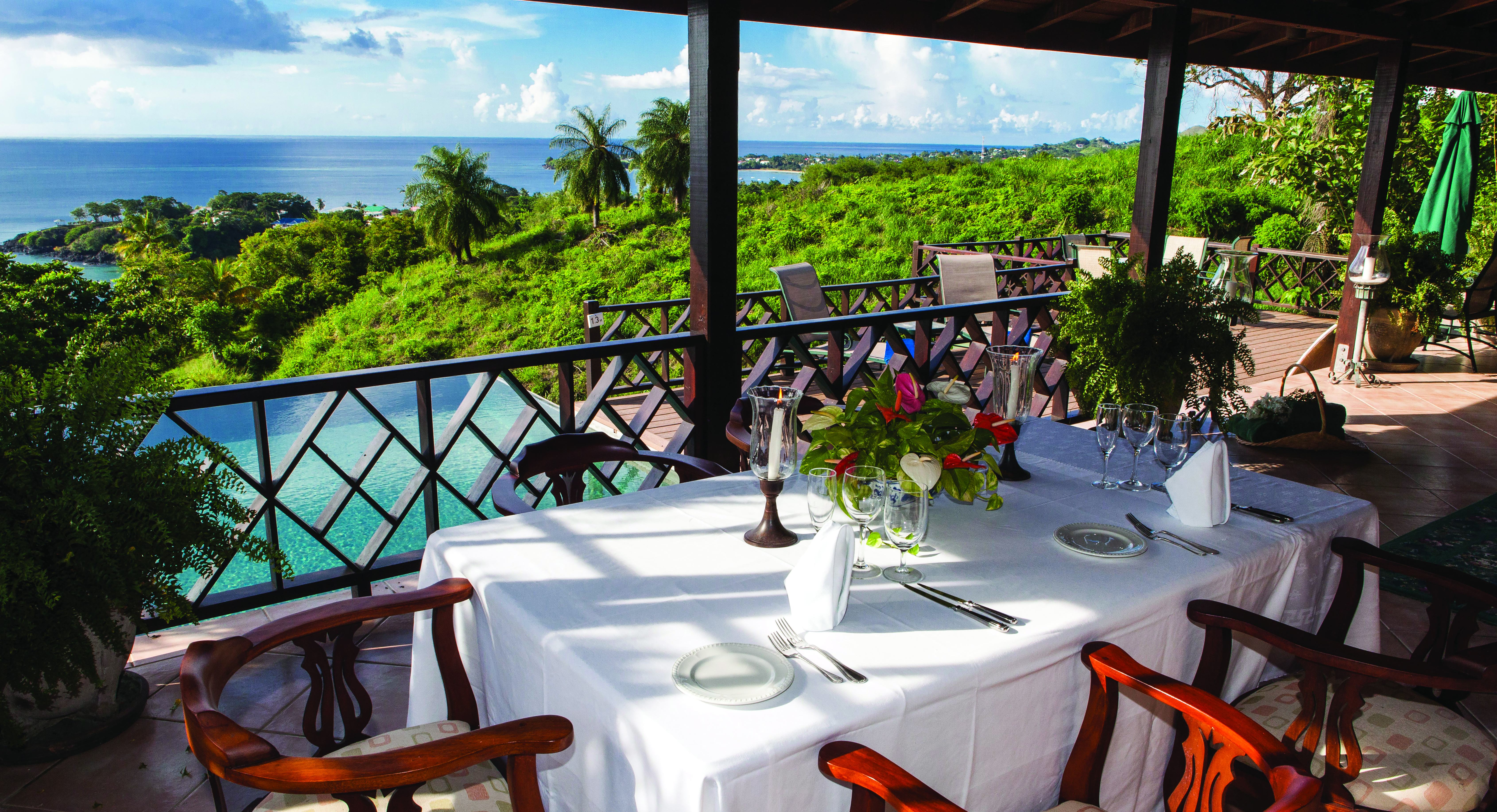 The Villas at Stonehaven Tobago villa veranda dining views of infinity pool and ocean
