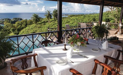 The Villas at Stonehaven Tobago villa veranda dining views of infinity pool and ocean
