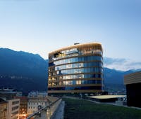 Adlers Hotel Austria exterior view of building with mountains in the background