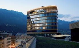 Adlers Hotel Austria exterior view of building with mountains in the background
