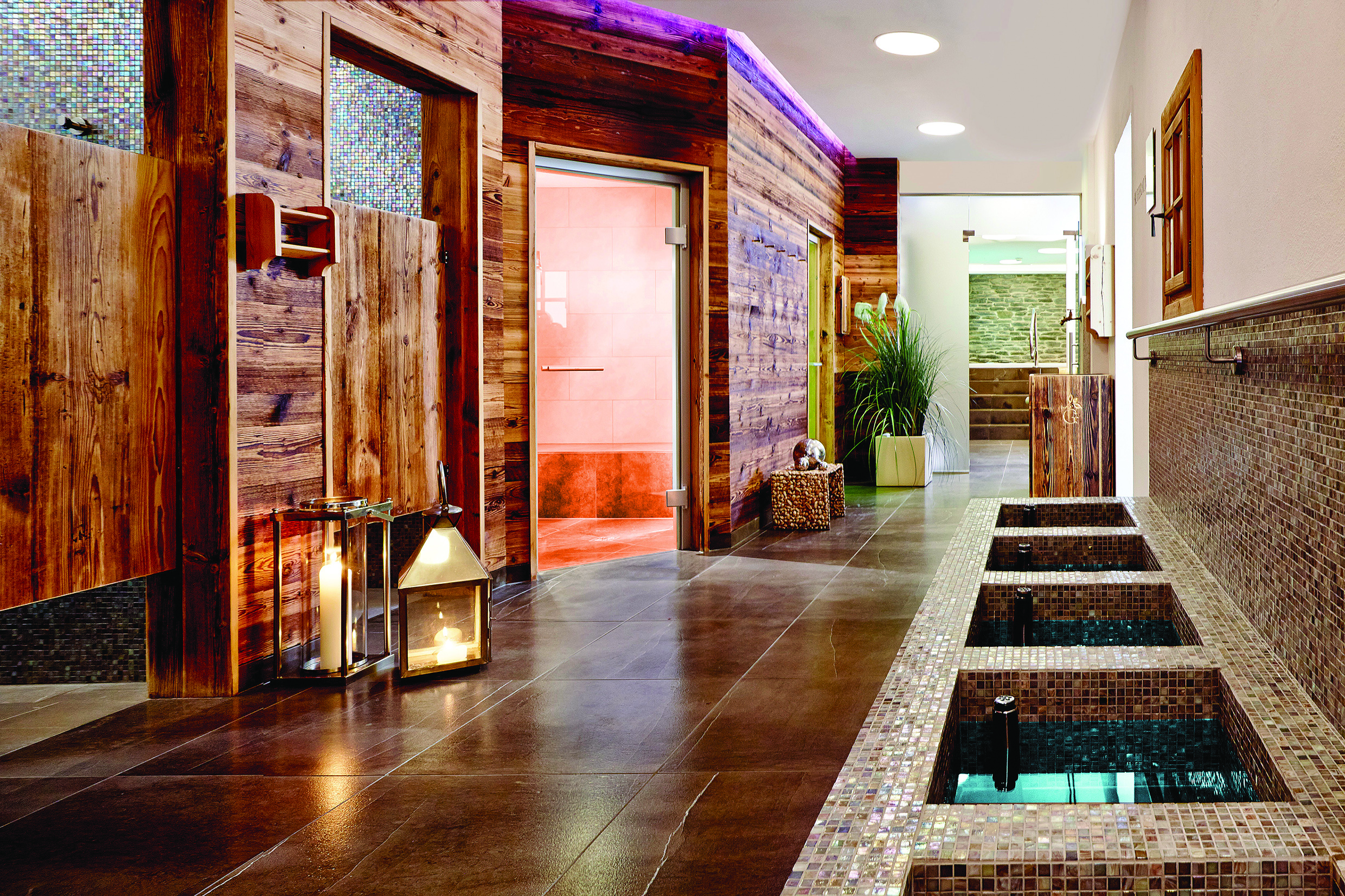 Spa walkway with sauna and steam room in sight