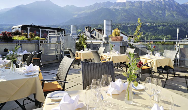Hotel Schwarzer Adler dining terrace, outdoor dining area with mountain views
