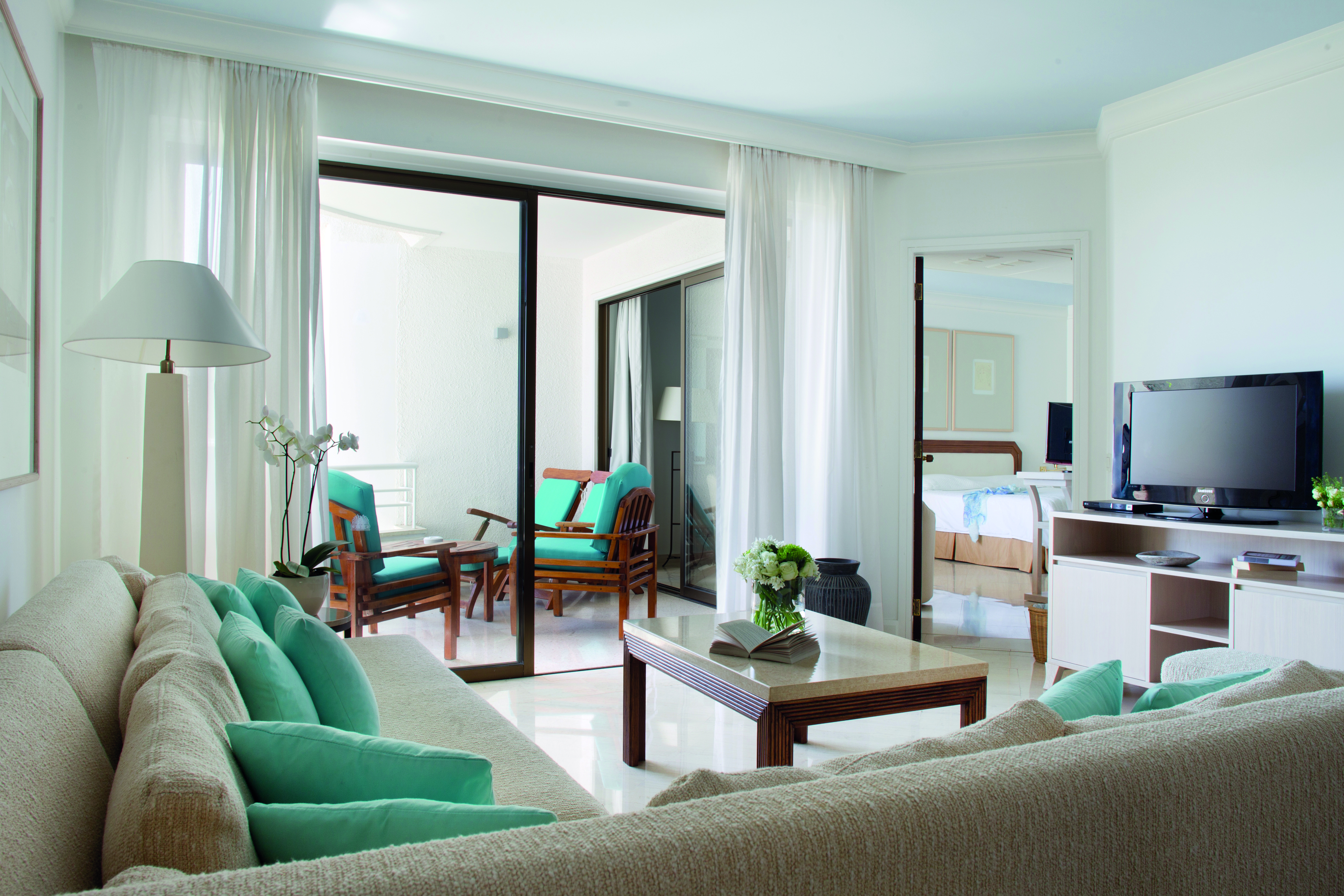 Annabelle Hotel Cyprus superior suite sitting room sofas and balcony with armchairs 