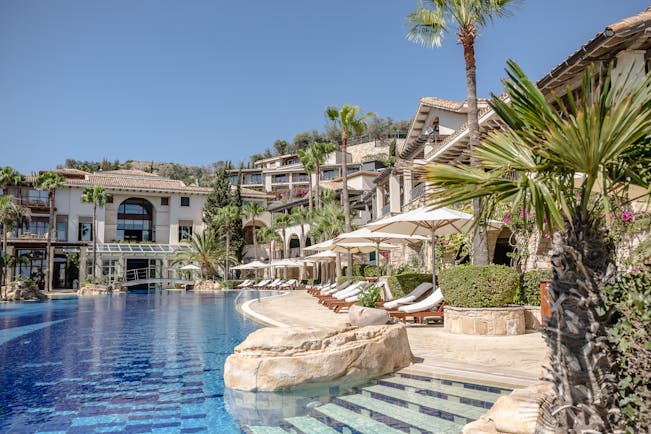 Columbia Beach Resort Cyprus outdoor pool with bridge and sun loungers