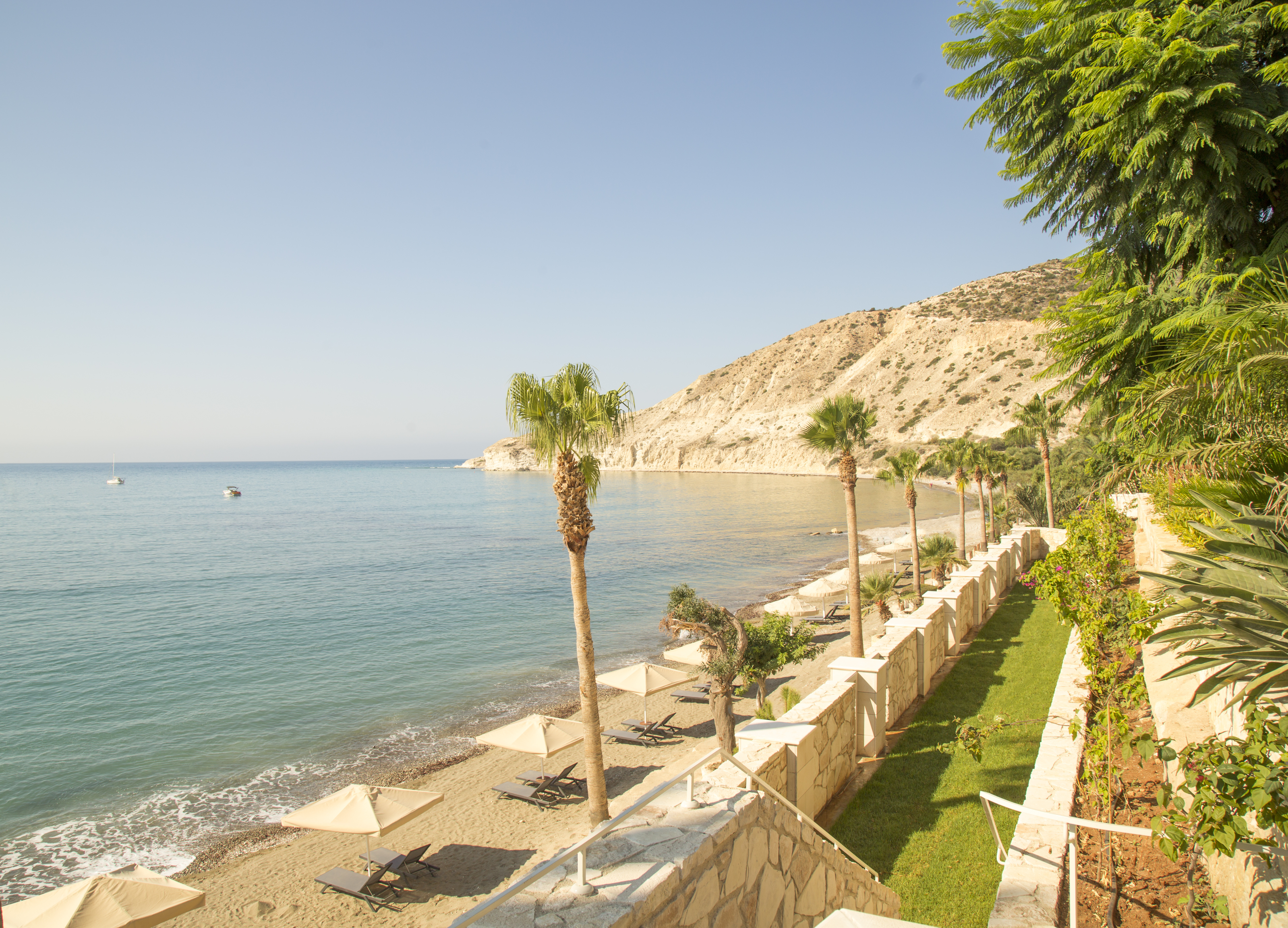 Columbia Beach Resort Cyprus Pissouri beach sun loungers and umbrellas