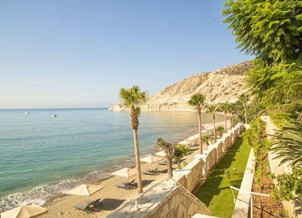 Columbia Beach Resort Cyprus Pissouri beach sun loungers and umbrellas