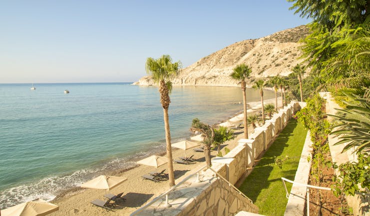 Columbia Beach Resort Cyprus Pissouri beach sun loungers and umbrellas