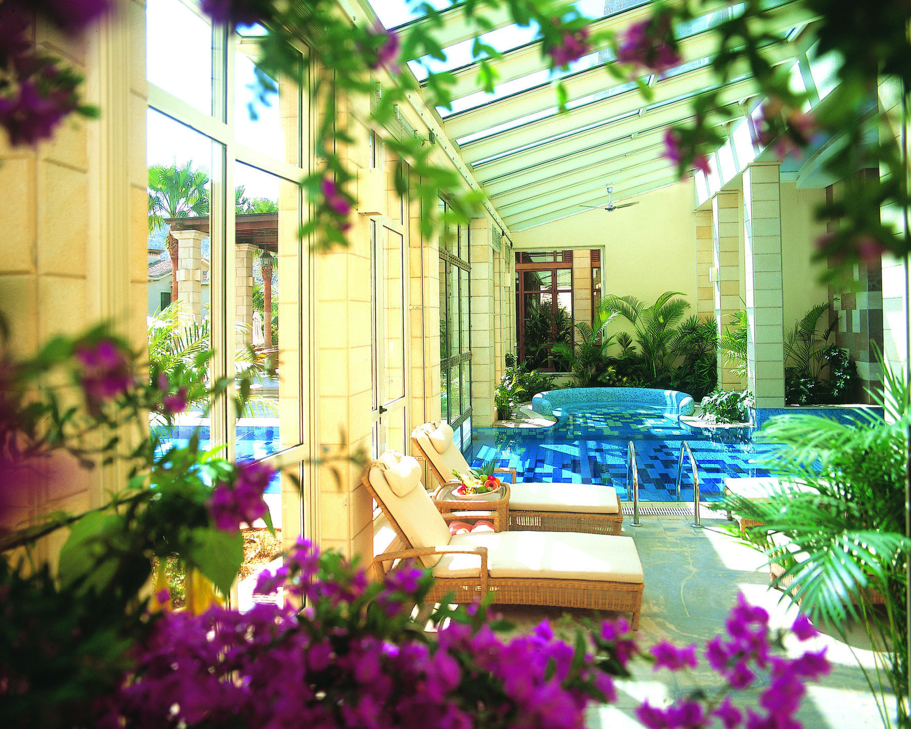 Columbia Beach Resort Cyprus spa pool indoor with large windows and loungers 