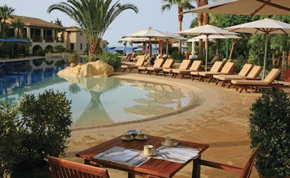 Columbia Beach Resort Cyprus terrace restaurant next to outdoor swimming pool 