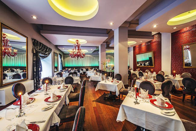 Grand Mark Prague restaurant, tables and chairs, modern colourful decor