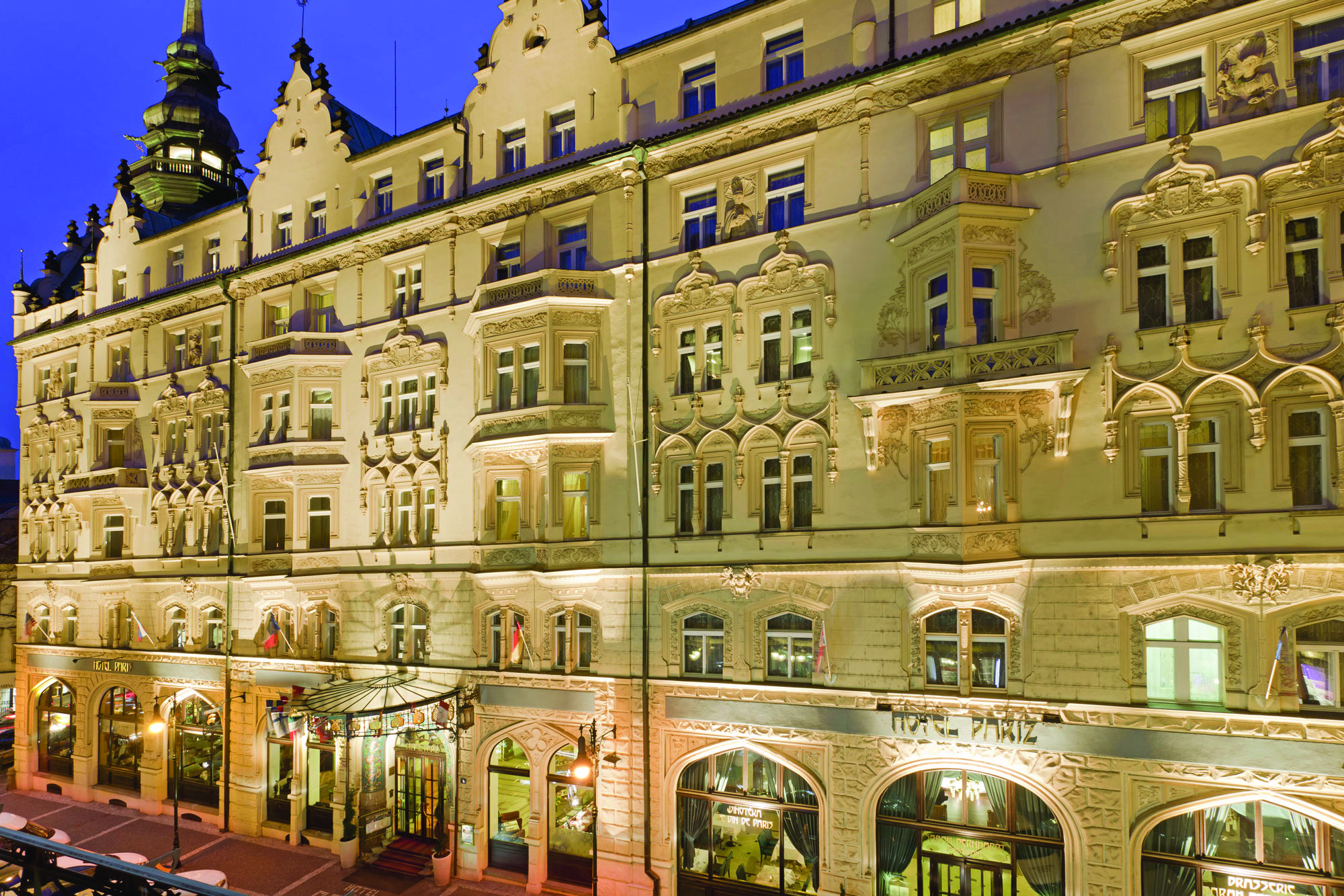 Hotel Paris Prague exteropr building with large windows sign reading 'Hotel Paris'