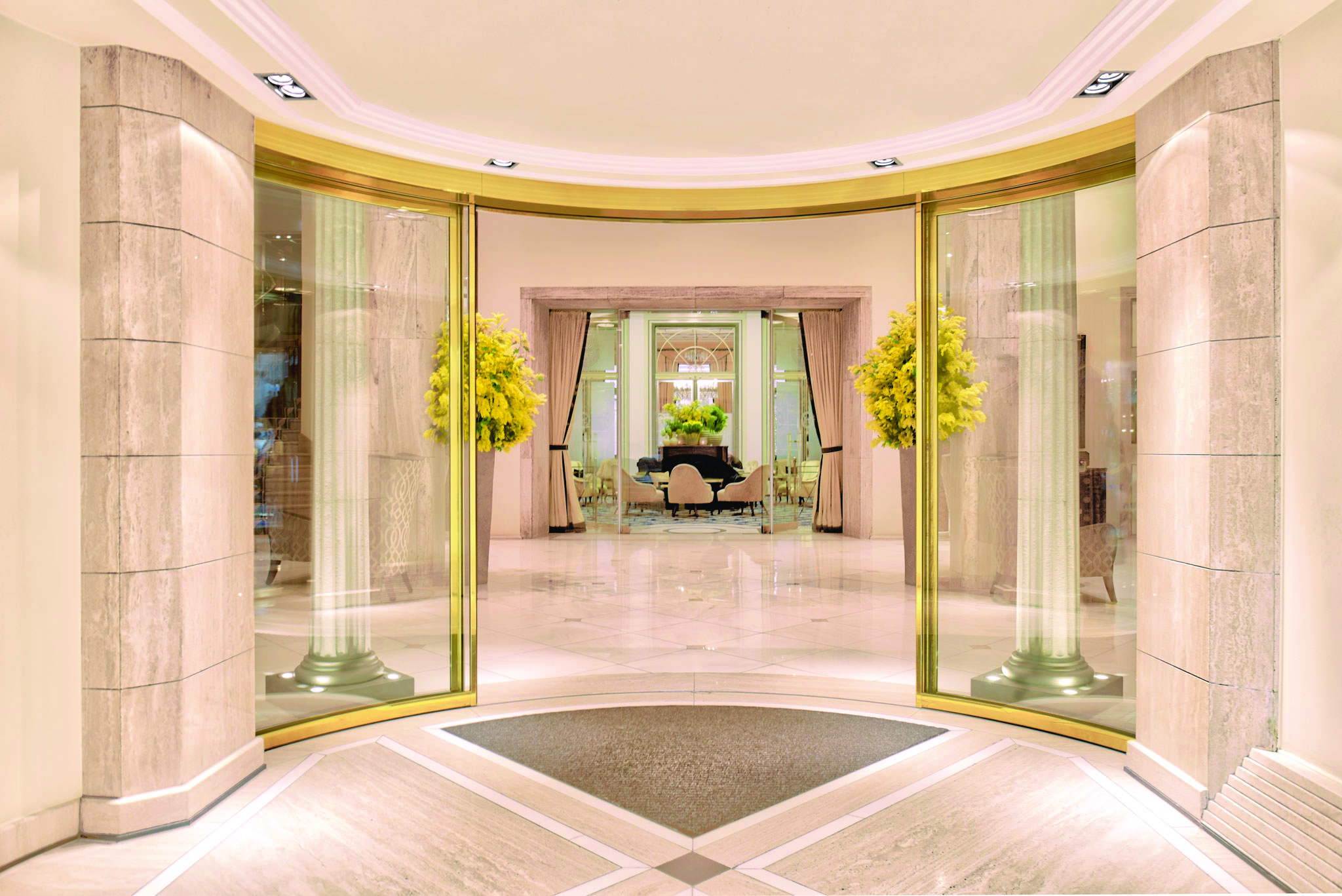 Excelsior Hotel Ernest Cologne lobby with marble floors and pink sofas