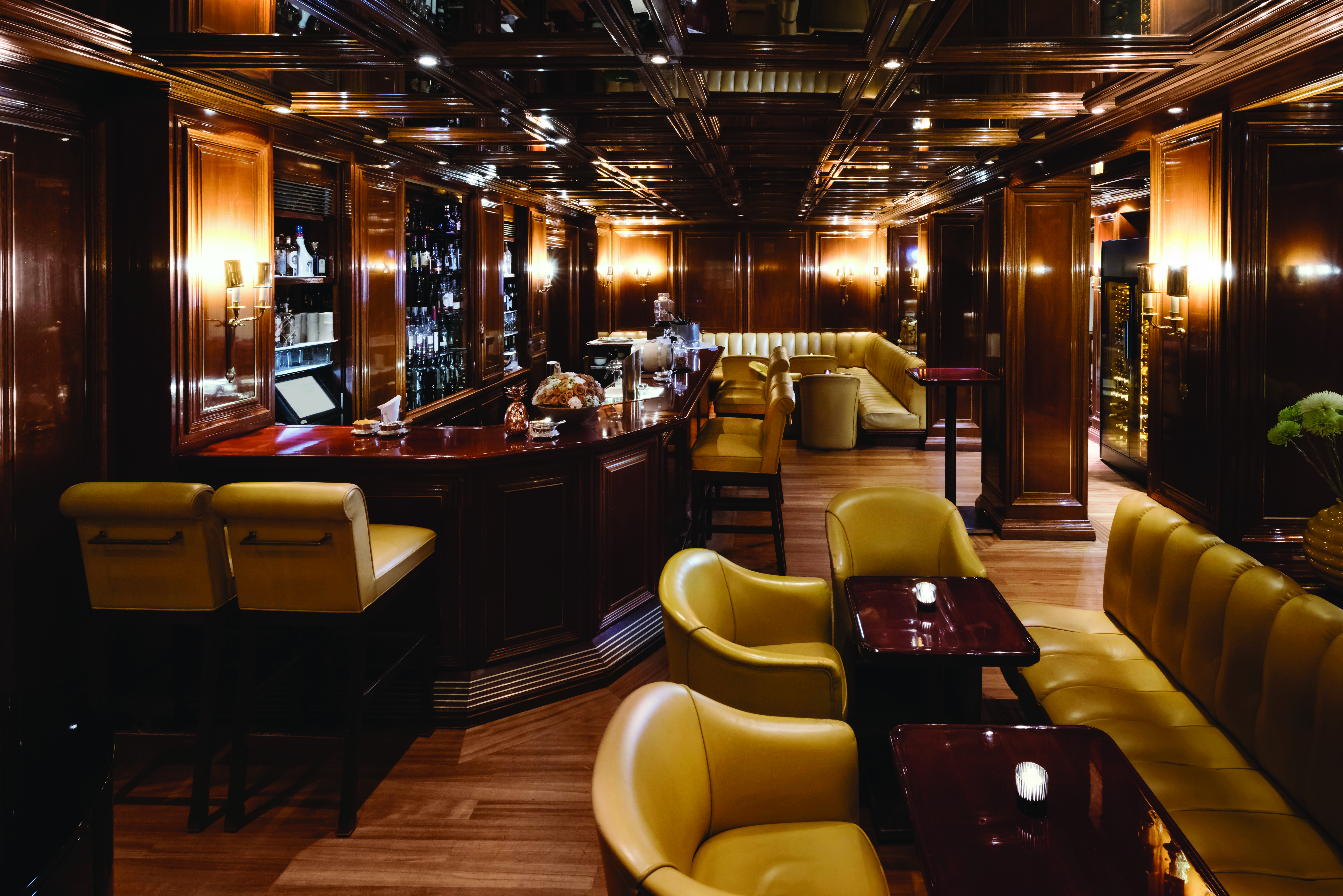 Excelsior Hotel Ernest Cologne piano bar dark wooden walls and bar leather barstools and chairs wooden tables