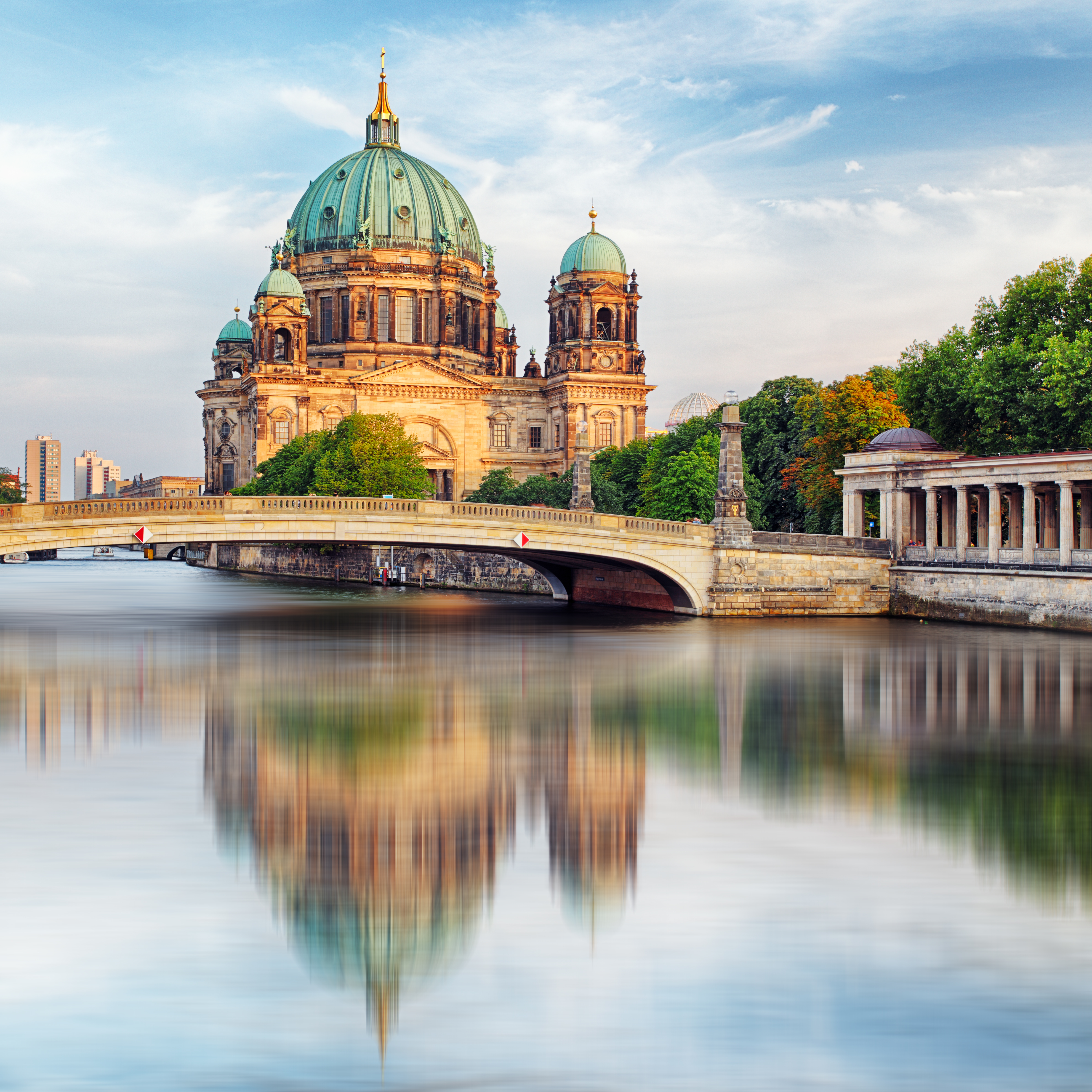 Berlin cathedral reflected in water of river spree