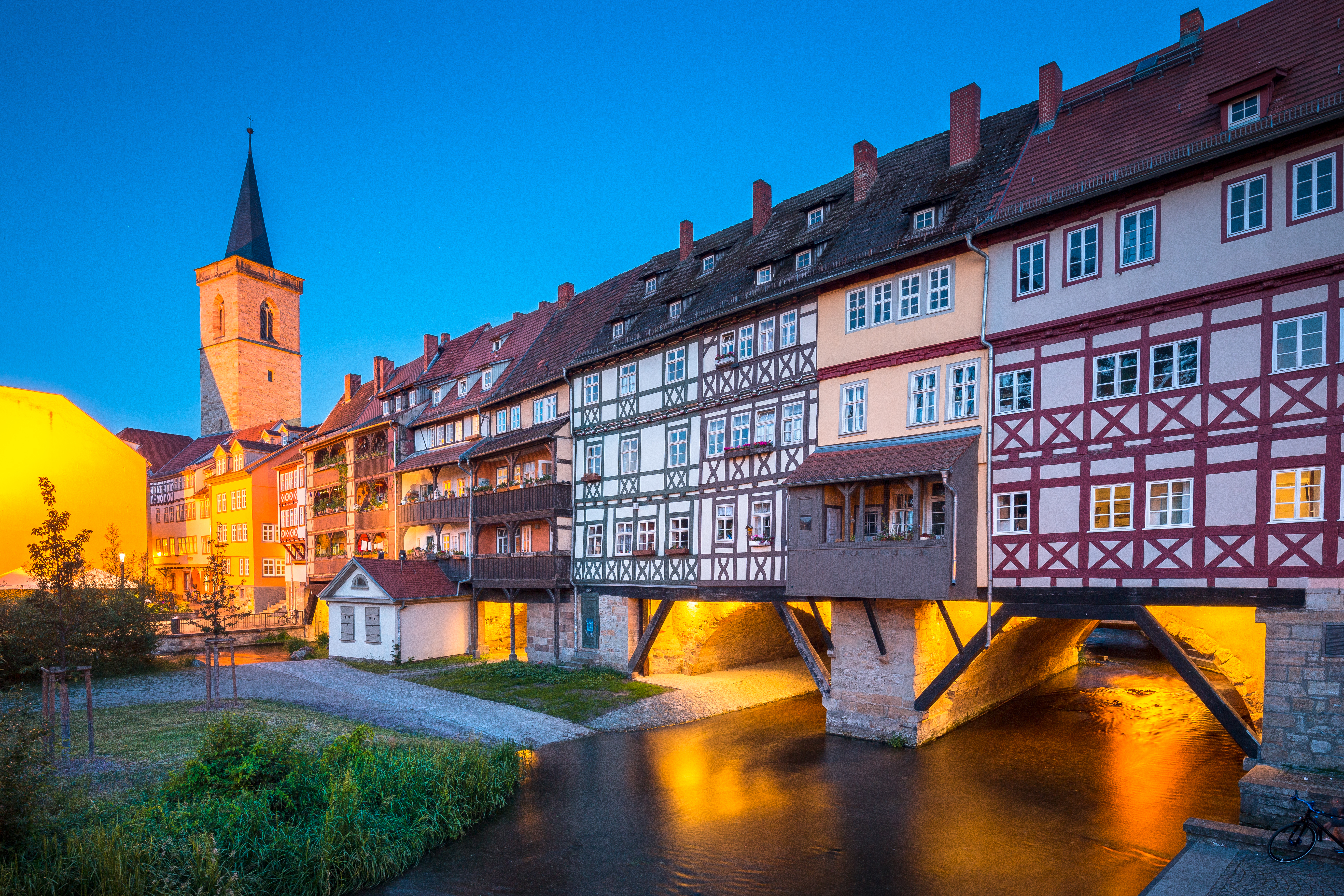 Half timbered houses at night on bridge in Erfurt