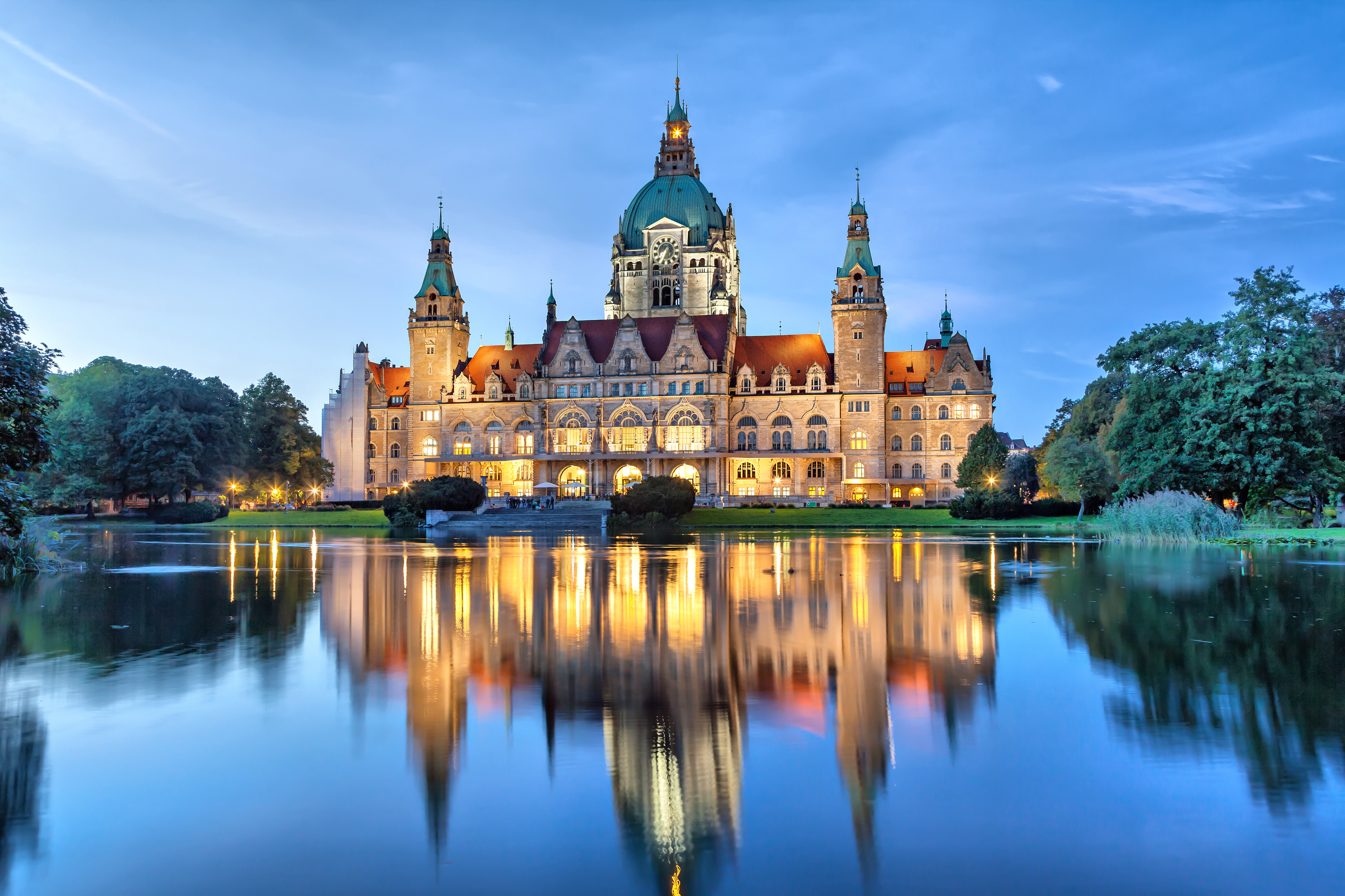 New city hall reflected in lake in Hannover